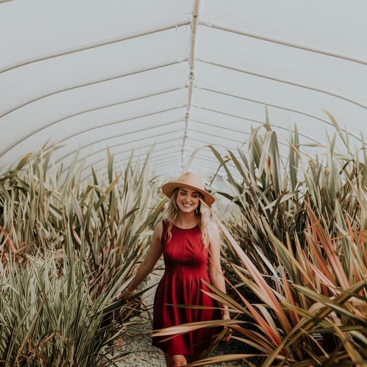Kaveri Mehta, Lead Design Curator at Modern Process Network, reviewing corporate floral arrangements